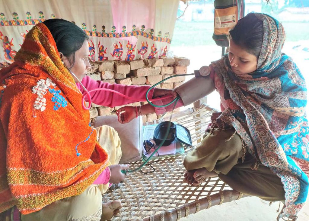 A woman CHE at work in a village in Uttar Pradesh