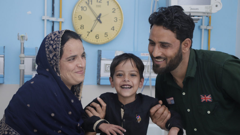 A happy Uzair with his family a few days after his surgery. 