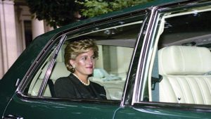 Princess Diana sitting in a car and smiling