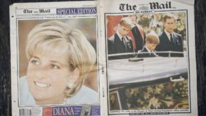 a newspaper clipping of Princess Diana and her children