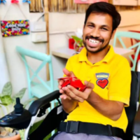 A person with disabilities at Mitti Cafe