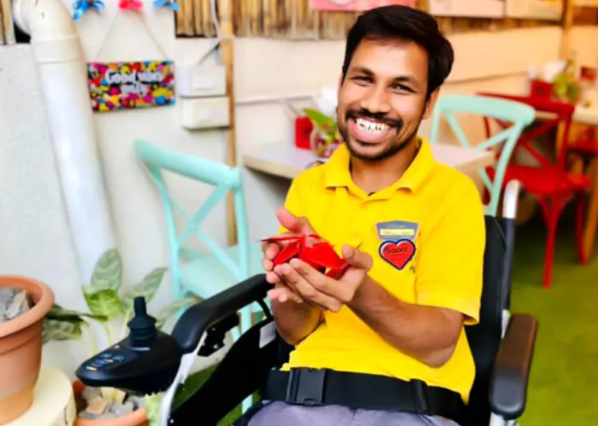 A person with disabilities at Mitti Cafe