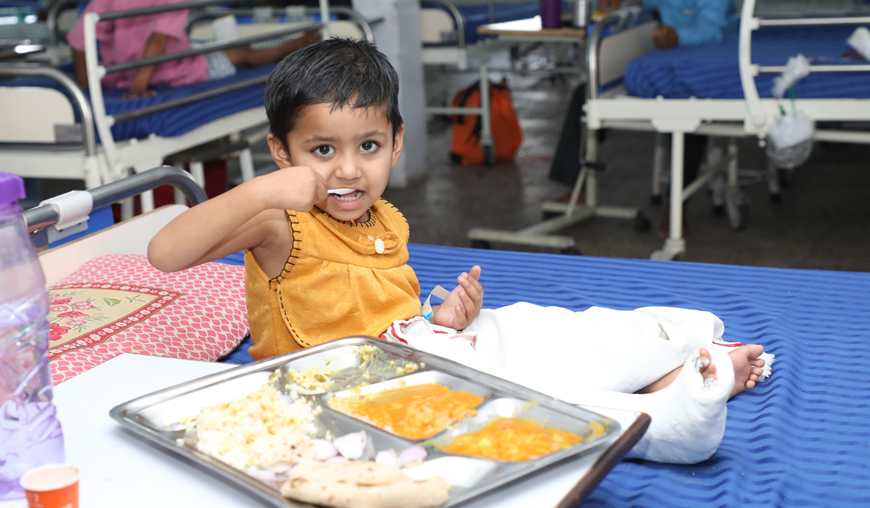 an Indian child eating