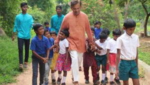 the founder of Shanti Bhavan with the children