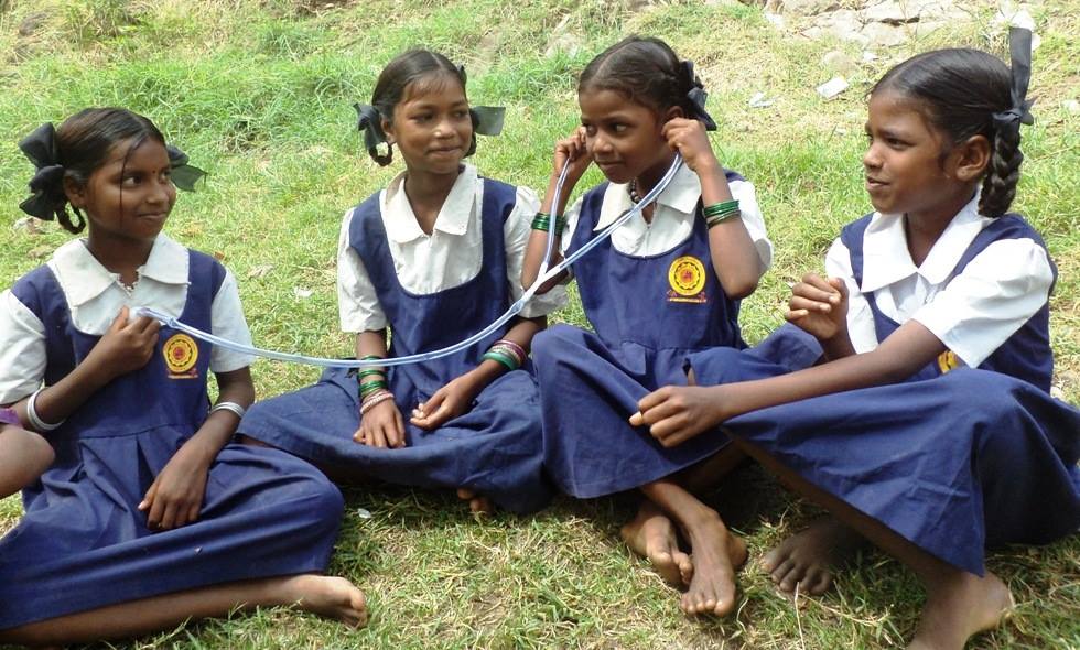 students from Idea Foundation sitting together outdoors