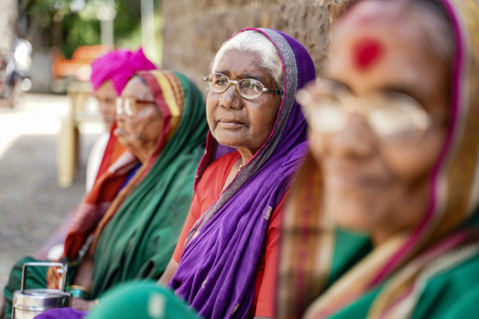 three elderly Indian women from Manavlok