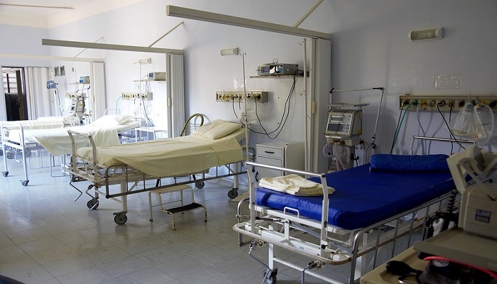 a hospital room with beds