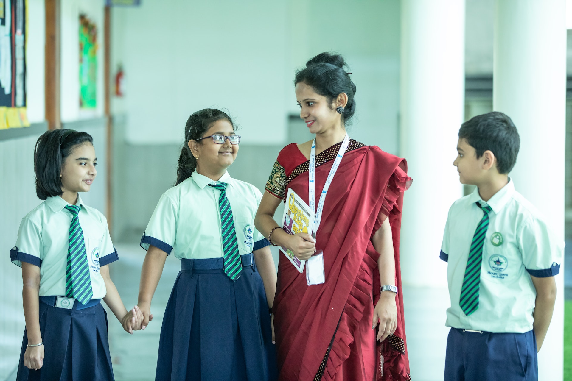 an Indian teacher with her students