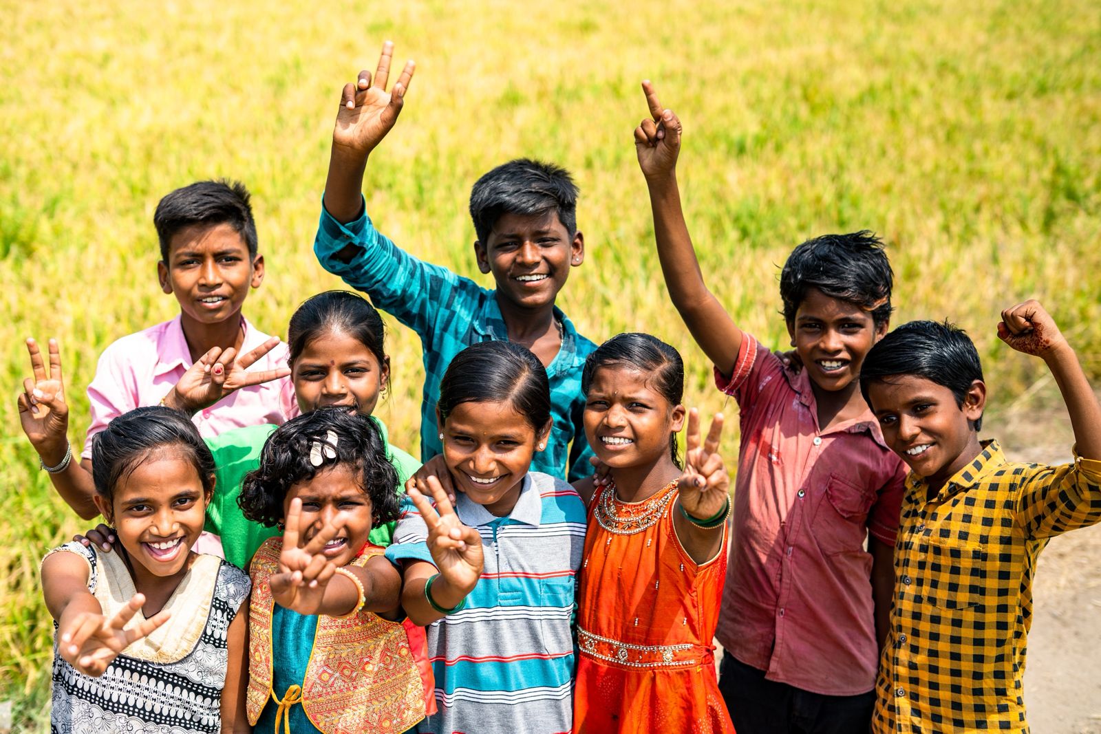 happy Indian children in a field
