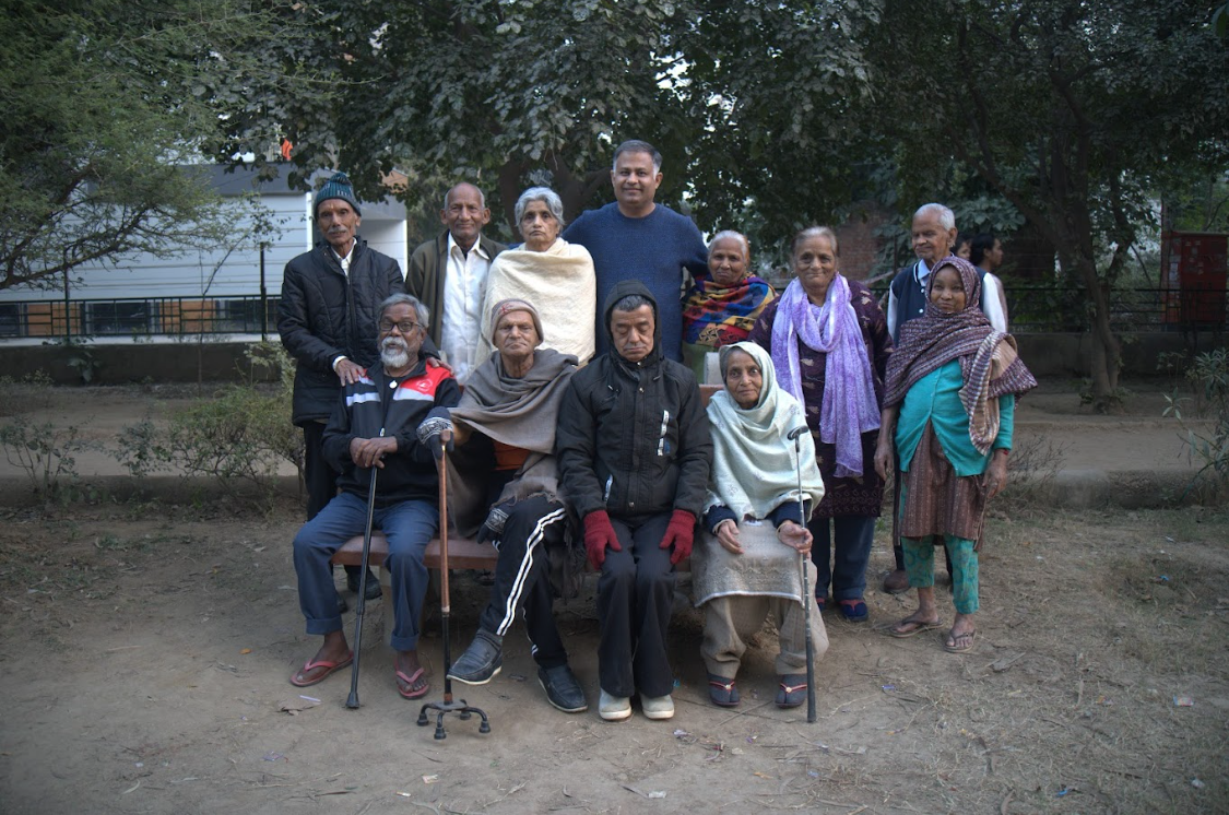 the founder of Sarthak Prayas with senior citizens at the home