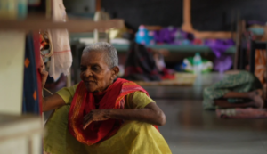 an elderly Indian homeless woman on the streets