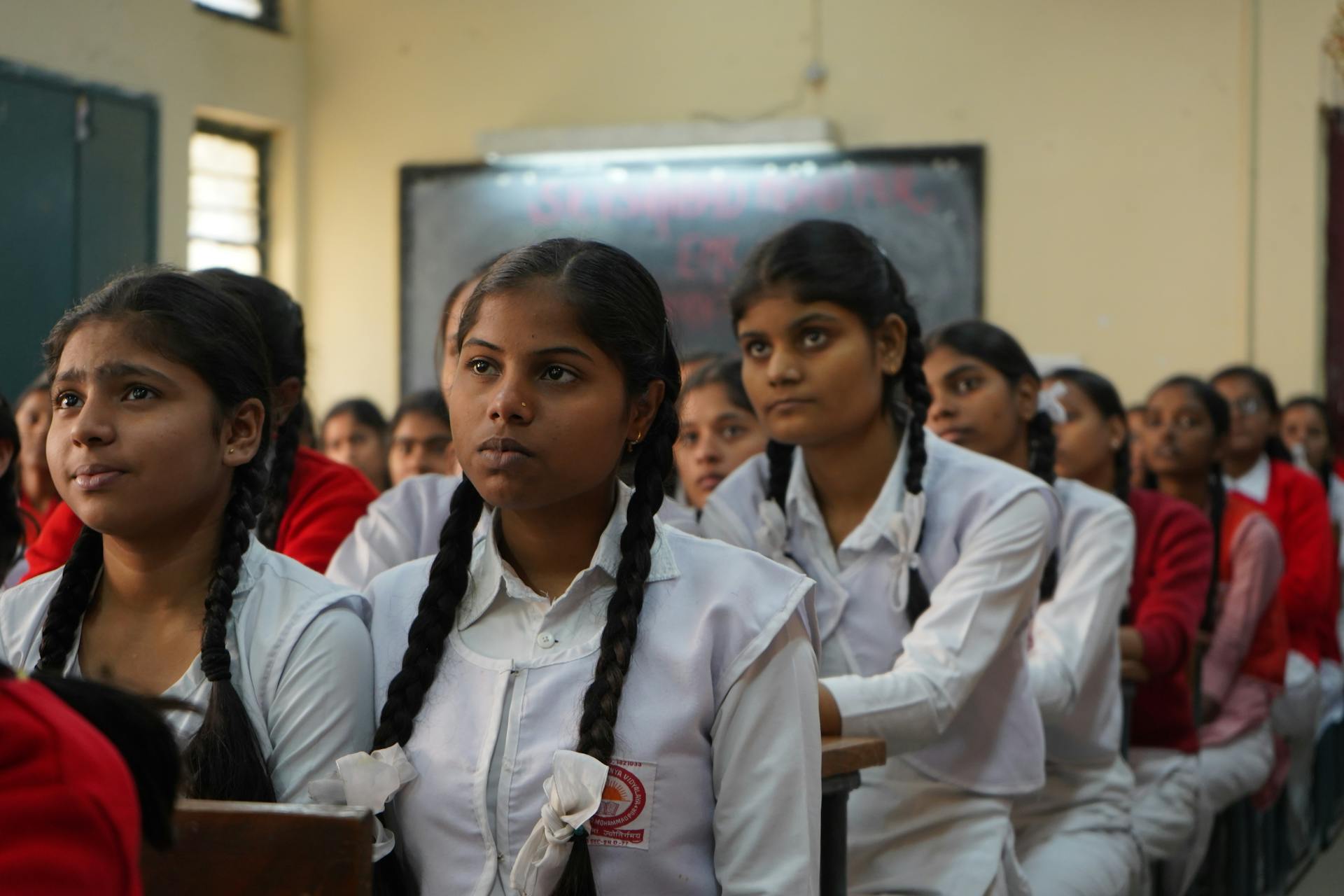 a classroom of female school children