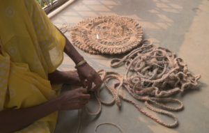 a woman weaving