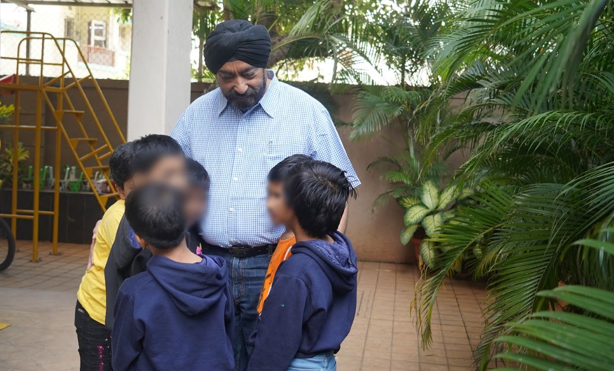 NGO leader with children