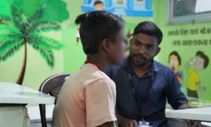 a counselor talking to a child