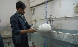 a man making a prosthetic limb